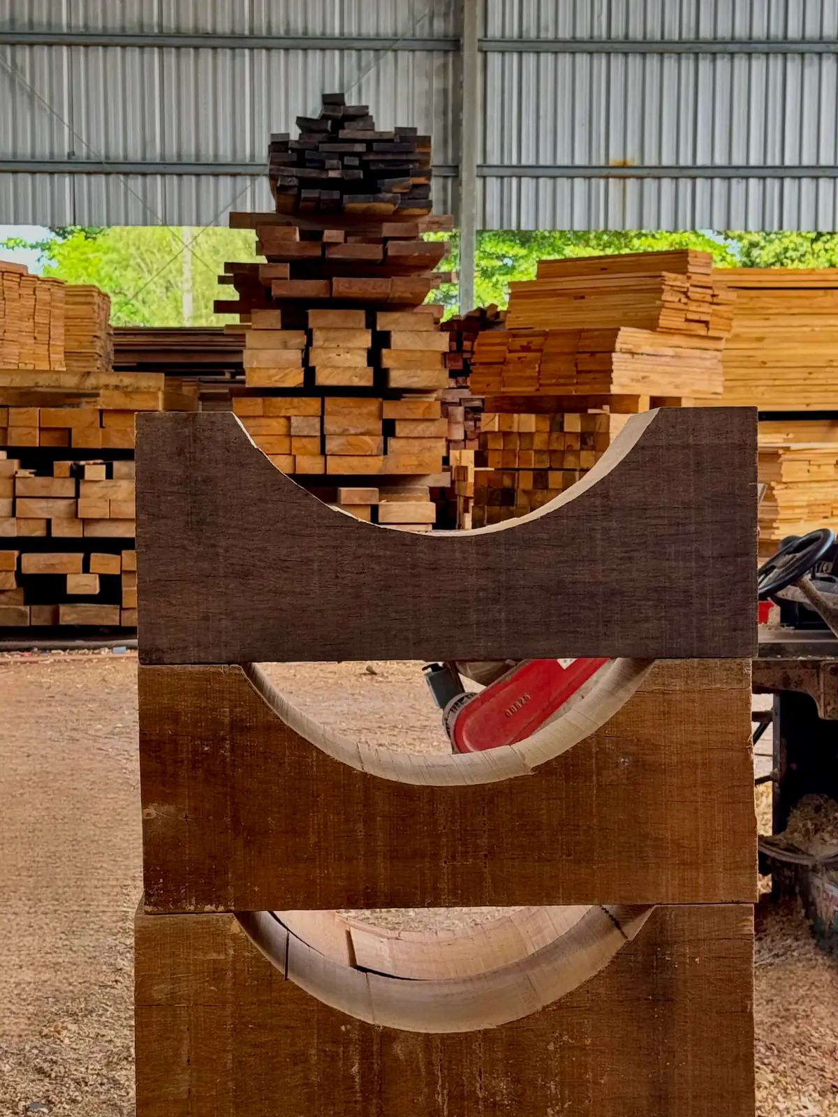 Custom timber saddles supporting a cylindrical component